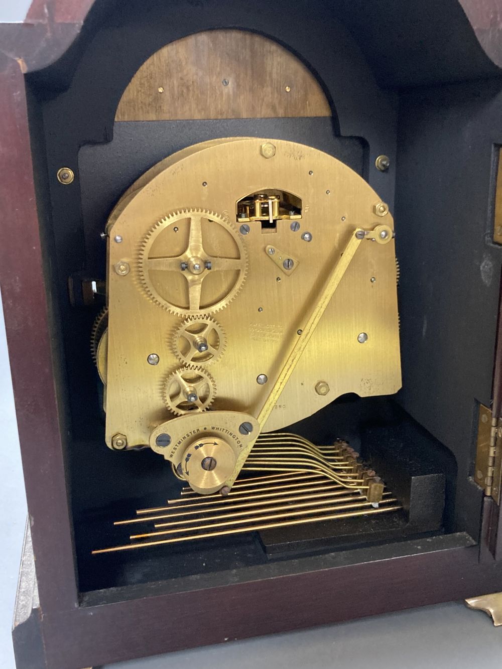 An Elliott mahogany chiming bracket clock, with traditional 14cm dial